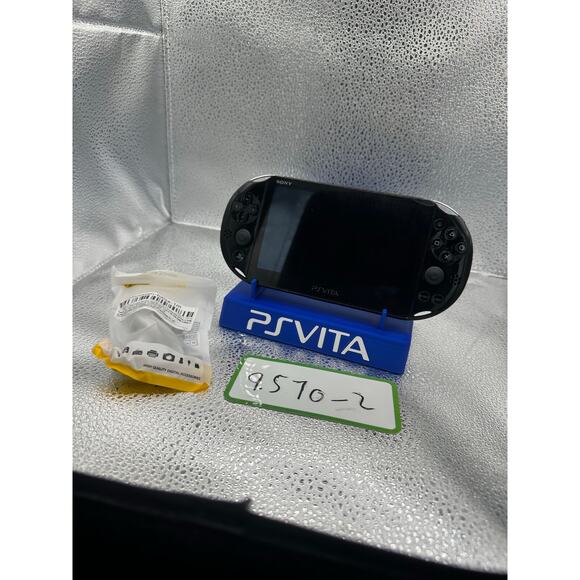 Black  ps vita 2000 w/charger and screen protectors - Picture 1 of 7